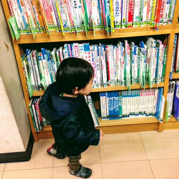 Kid in library